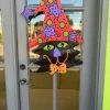 DEMDACO Decor Cat Witch Door Hanger